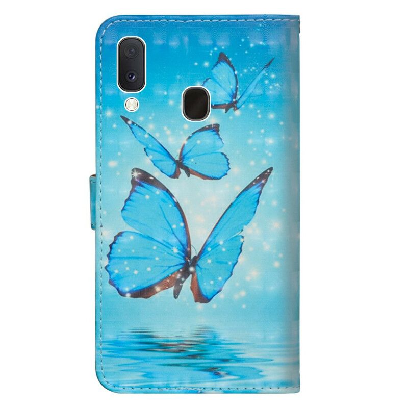 Læder Cover Samsung Galaxy A10e Flyvende Blå Sommerfugle